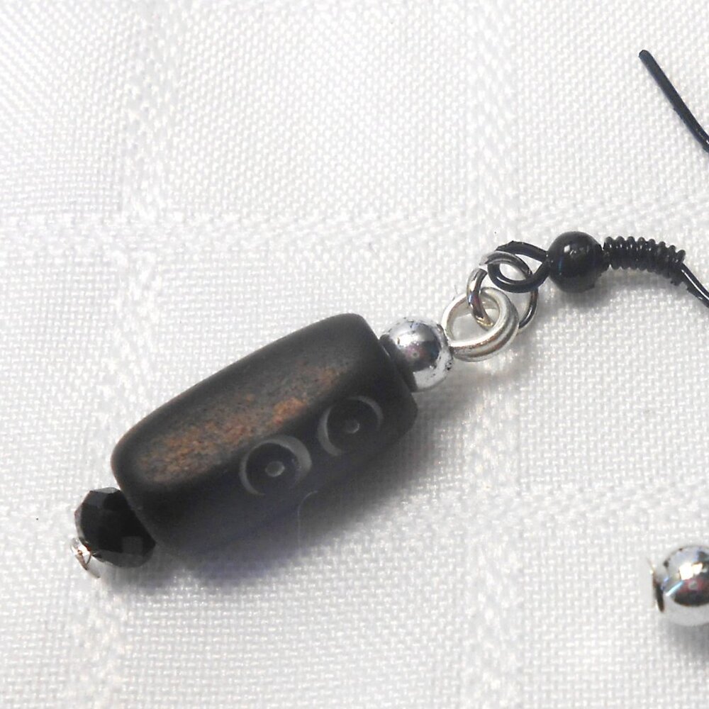 Beautiful handmade asymetrical earrings with engraved elk bone no 1661